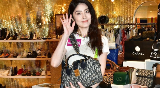 陈慧琳义卖8000件二手衣物成热门事件,警方介入维护秩序-陈慧琳收伞