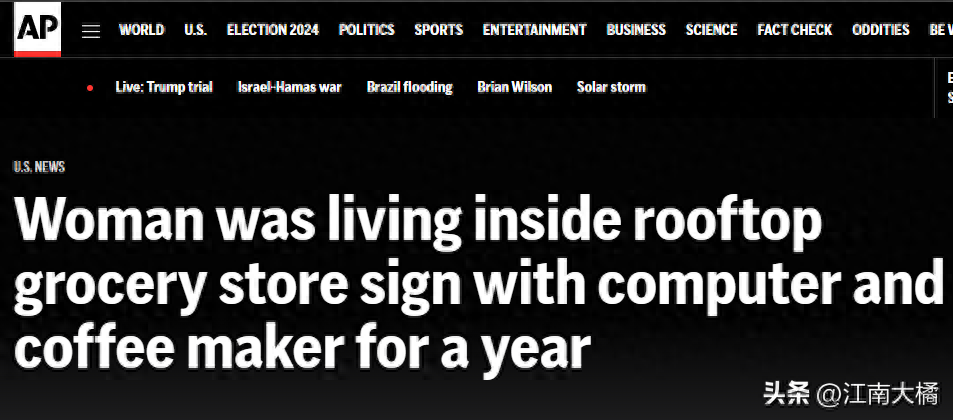 离奇!女子商店招牌内蜗居一年,电脑咖啡机一应俱全